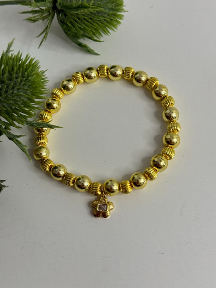 Hematite with Gold Filled Carved Beads with Small Flower Charm