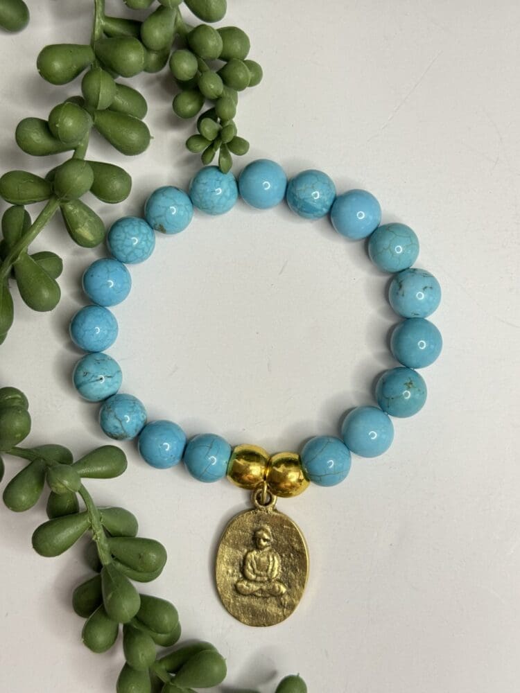 Howlite with Gold Beads & Tibetan Charm