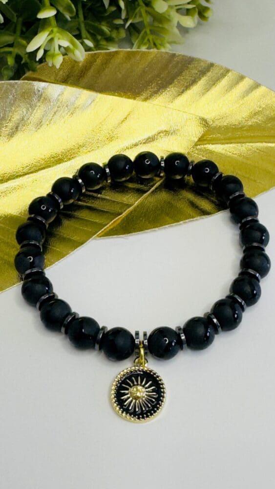 Onyx with Gold & Black Sun Charm