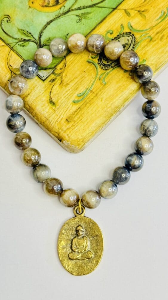 Tiger Eye with Tibetan Gold Charm