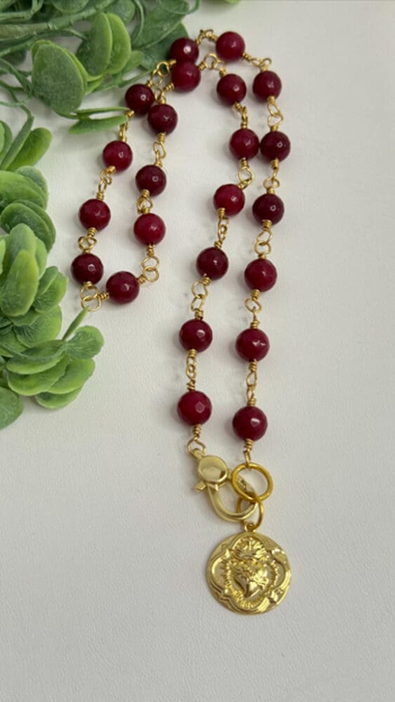 Faceted Ruby Jade, Wire Wrapped with Sacred Heart Pendant