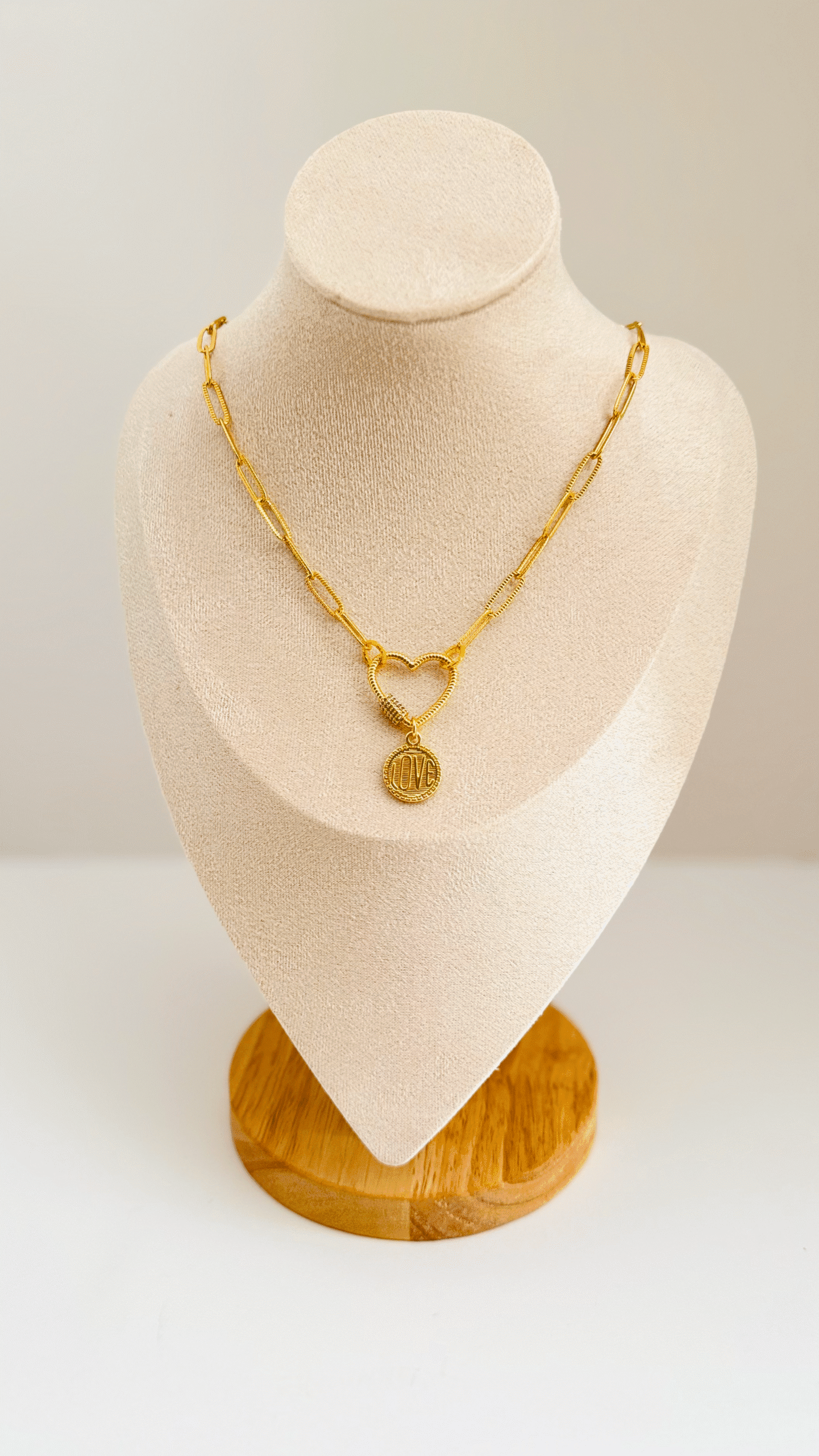 Gold necklace with heart clasp