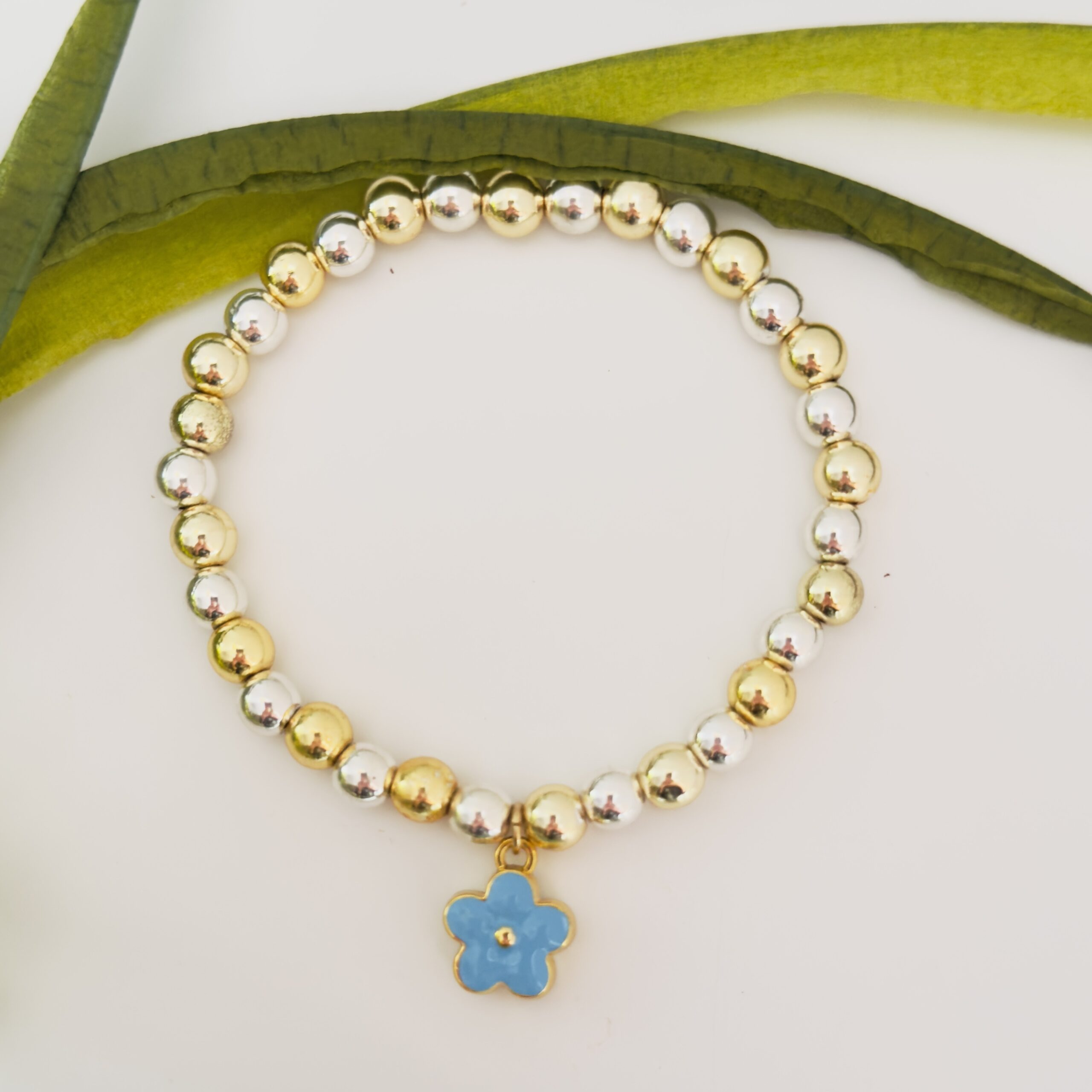 Gold & Silver Hematite with blue flower charm